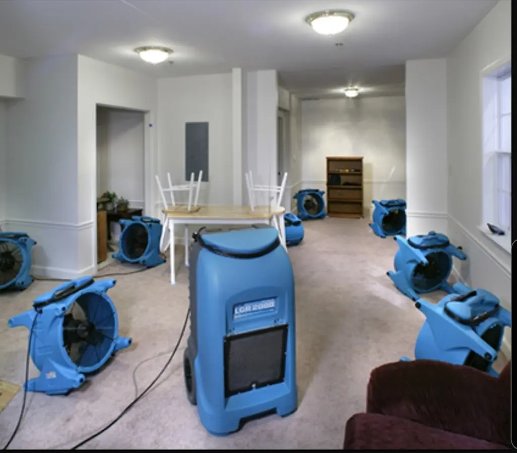 Air movers and dehumidifier setup for Water Extraction & Removal in Louisburg